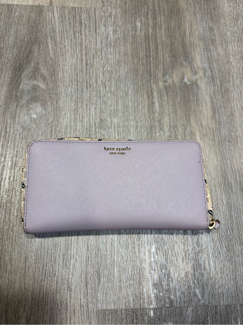 kate spade pastel lavender zip-around continental wallet with gold logo